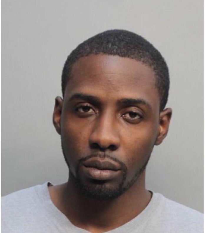The suspect in a triple shooting that killed two Bethune-Cookman University students died after hanging himself in his Miami jail cell.