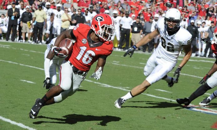 UGA wide receiver Isaiah McKenzie has been accused of making terroristic 'threats or acts' stemming from an incident with a woman at a Chili's restaurant Monday night.