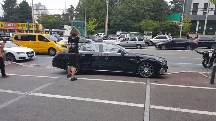 A video posted to YouTube shows a man smashing up his brand new $170,000 Mercedes-Benz S63 AMG.