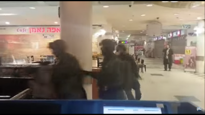 panic inside the Central Bus Terminal as people claimed they saw a second terrorist run inside. Dozens of heavily armed IDF Soldiers, Police officers and special commandos swarmed the building until it was determined that the terrorist had acted alone,.