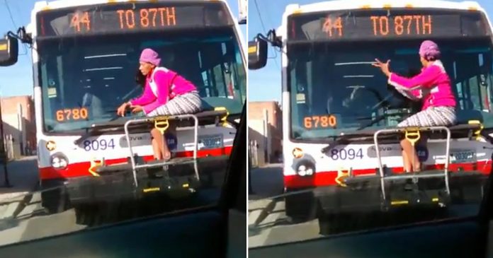 A viral video shows a Chicago woman attaching herself to a bike rack on the front of a city bus and claiming to be a bicycle.
