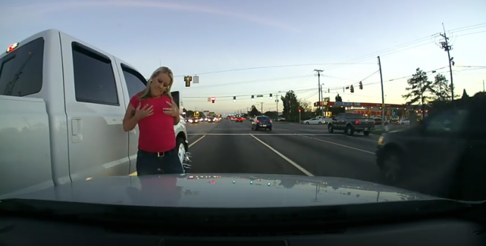 Another crazy road rage video shows a passenger get out of a truck after an accident and berate the other driver.