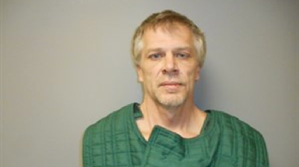 Police say Bartelt had a shotgun, a can of gasoline, and a propane tank. He never pointed a weapon at officers, but was holding a shotgun under his chin and was threatening to harm himself, according to police. Police say at one point, Bartelt was holding the can of gasoline and 