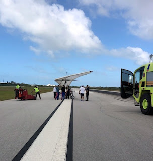 WATCH: Cuban Migrants Fly Into Key West Airport On Hang Glider